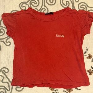 Brandy Melville Coral T-Shirt with 'Peachy' Design